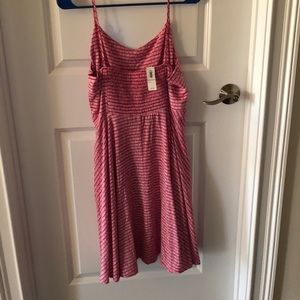 Red/pink dress with white stripes. NEVER BEEN WORN